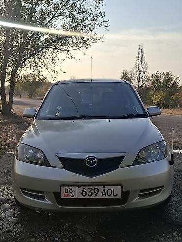 мини желмаян: Mazda Demio: 2003 г., 1.3 л, Автомат, Бензин, Хетчбек — 2