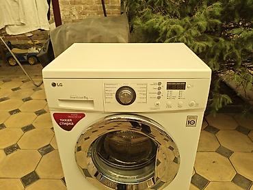 фронтальная машина: Стиральная машина LG с фронтальной загрузкой, Inverter Direct Drive — 2
