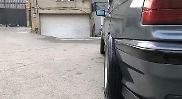 bmw lip: BMW 3 Series E36 sedan – tünd boz rəngdə, klassik kuzov xəttləri ilə — 4