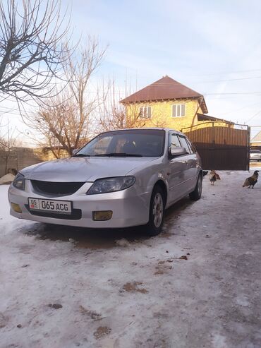 Mazda: Mazda 323: 2002 г., 1.6 л, Механика, Бензин, Хэтчбэк