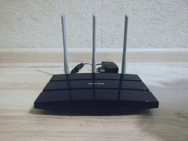 Модемы и сетевое оборудование: Гигабитный wi-fi роутер TP-Link TL-WR1045ND v2, N450, отлично
