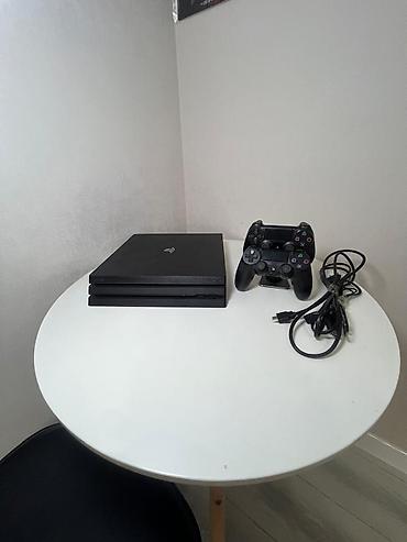 PS4 (Sony PlayStation 4): PlayStation 4 Pro (черный) Комплектация: - игровая консоль PS4 Pro — 4