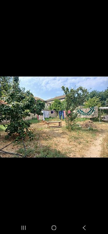 участок с времянкой: Satılır: həyətyanı torpaq sahəsi - Hasara alınmış, dörd tərəfi daş — 2