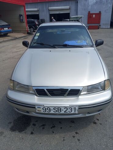 Daewoo: Model: Daewoo Nexia sedan Kuzov: 4 qapılı, gümüşü rəng — 4