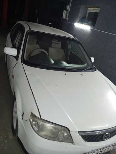 по следующим выкуп: Mazda Familia: 2002 г., 1.6 л, Автомат, Бензин, Вэн/Минивэн