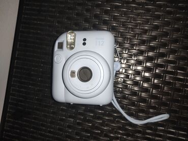 инстакс мини: Фотоаппарат моментальной печати Fujifilm Instax 12 в голубом корпусе