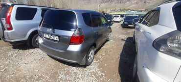 футболка с: Honda Fit: 2003 г., 1.5 л, Автомат, Бензин, Хэтчбэк