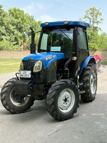 satisda olan traktorlar: Müasir dizaynlı, mavi rəngli YTO MF504X PRO markalı traktor.kanserini