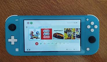 Nintendo Switch: Original Nintendo SWITCH Lite konzola tirkiz - GRATIS eShop ORIGINAL — 13