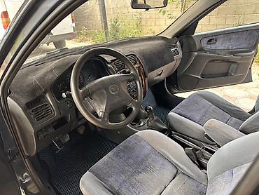 mazda 623: Mazda 626: 1997 г., 1.8 л, Механика, Бензин, Хэтчбэк — 5