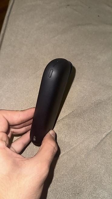 meduza qelyan: IQOS elektron tütün cihazı və qutusu. Tünd rəngli, kompakt və — 2
