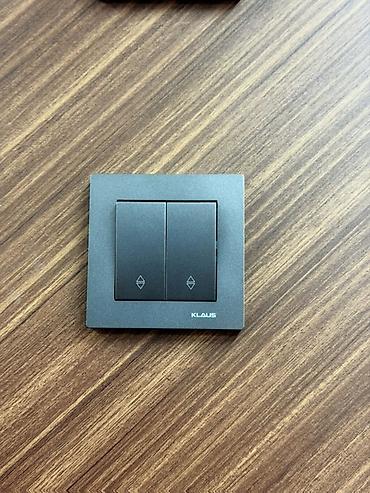 Выключатели: Настенные выключатели KLAUS, графитовый матовый цвет. Описание: - — 3