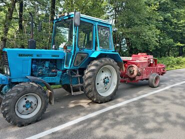 Mitsubishi: Belarus 82 (Беларус 82) traktor, mavi rəngdə, kabinəli. Ön və arxa
