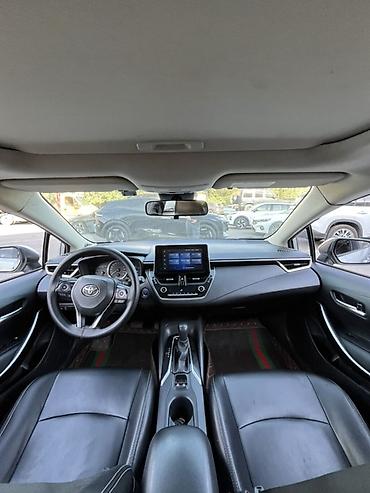 селика: Toyota Corolla: 2020 г., 1.8 л, Автомат, Гибрид, Седан — 8