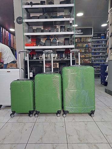 Çamadanlar: Yük daşıma üçün 3-lü sərt korpuslu çamadan dəsti - Rəng: yaşıl - — 1