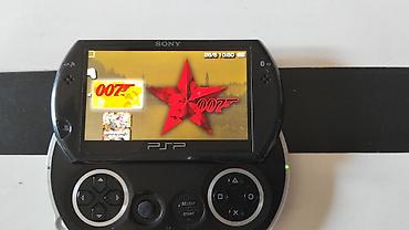 plastation klub: Psp Go ideal vəziyyətdə, original reklamı var,11 oyun var: Agent 007 — 1