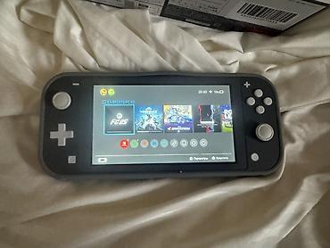 nintendo switch lite: Nintendo Switch Lite (серый) — компактная портативная версия Switch — 3
