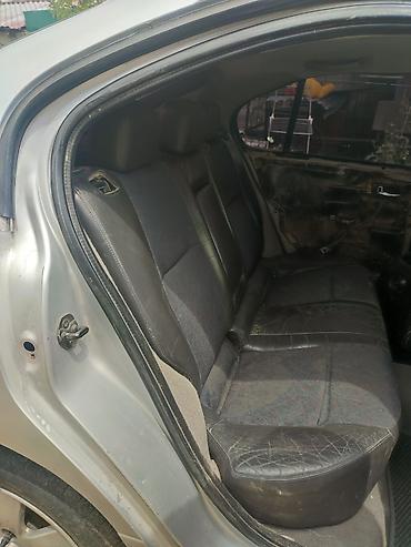 e5 olom: Nissan Primera: 2000 г., 1.8 л, Механика, Бензин, Седан — 6