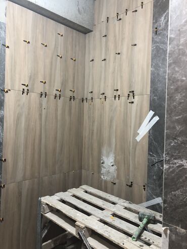 Укладка плитки: Подготовка стен для укладки, Резка плитки, Укладка плитки на откосы, окна, двери | Керамическая плитка, Стеклянная плитка, Мраморная плитка | Вертикальная укладка, Горизонтальная укладка, Диагональная укладка Больше 6 лет опыта — 10