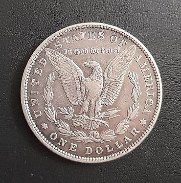 орёль: Серебряный доллар Моргана, 1889 г. - Номинал: One Dollar (США) - Тип — 2