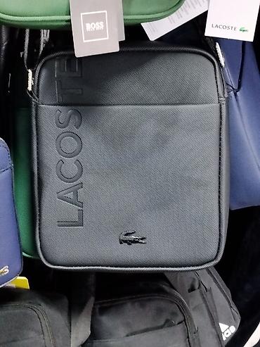 Сумка через плечо Lacoste - Компактная вертикальная сумка для at lalafo.kg Сумка через плечо Lacoste - Компактная вертикальная сумка для