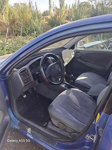 обшивки на бмв: Toyota Avensis: 1998 г., 1.8 л, Механика, Бензин, Лифтбек — 6