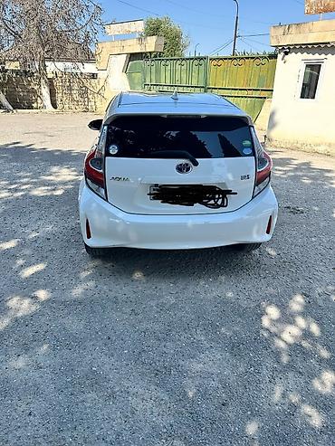 aqua disk: Toyota Aqua Hybrid hatchbek - Yanacaq sistemi: Hibrid (benzin + — 2