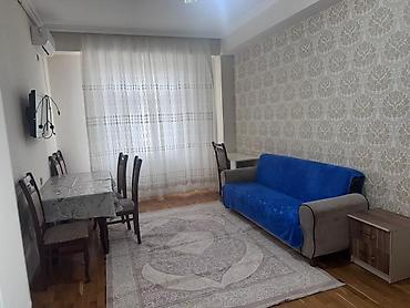 Mənzillər: 2otaqlı mənzil – tam mebelli və texnikalı Planlama: - Geniş qonaq — 1