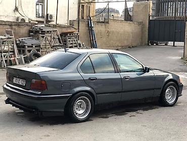 bmw lip: BMW 3 Series E36 sedan – tünd boz rəngdə, klassik kuzov xəttləri ilə — 2