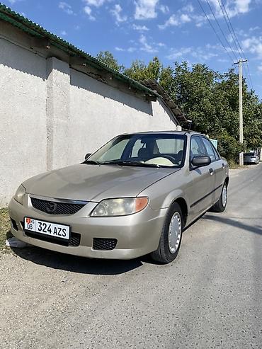 mazda 2004: Mazda 323: 2003 г., Автомат, Бензин, Седан — 1