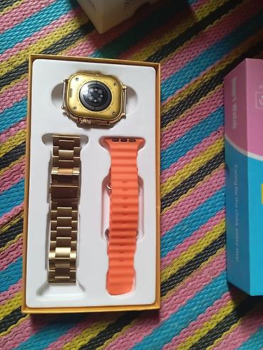 google pixel watch: Ağıllı saat dəsti. Dəstə qızılı rəngli kvadrat formalı ağıllı saat — 1