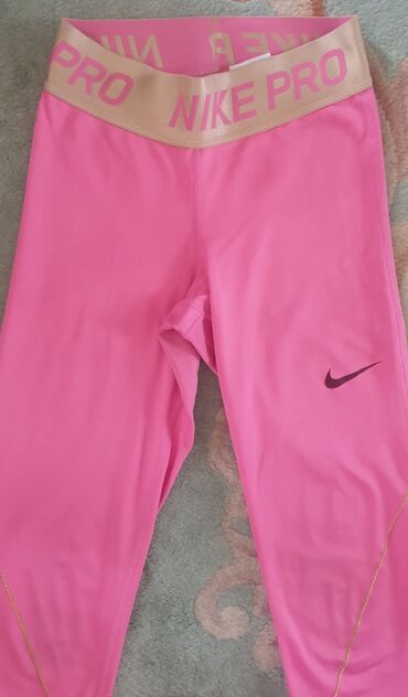 Helanke, biciklistički šortsevi: NIKE pro dri fit original helanke roze boje sa zlatnom debelom gumom — 3
