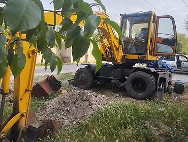 bud e9: Экскаватор, Колесный — 3