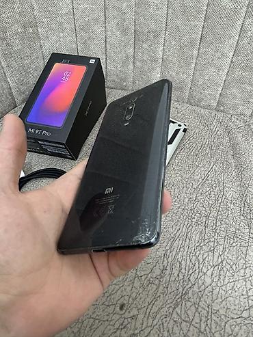 tecno coman 40pro: Xiaomi Mi 9T Pro, 128 GB, rəng - Qara, 
 Barmaq izi, İki sim kartlı, Face ID — 2