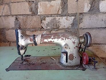 Elektrik mühərrikli tikiş maşını satılır. Maşın sənaye tipli metal