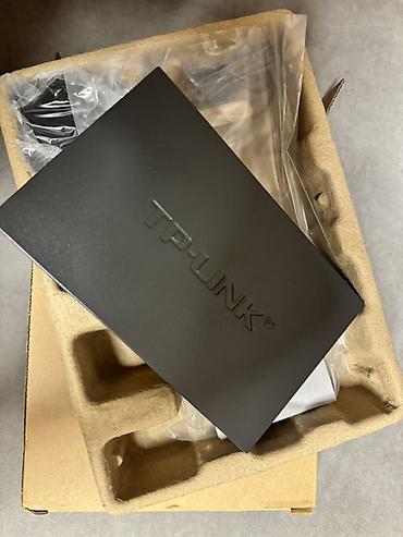 TP-Link — сетевое устройство в компактном металлическом корпусе (цвет at lalafo.kg TP-Link — сетевое устройство в компактном металлическом корпусе (цвет