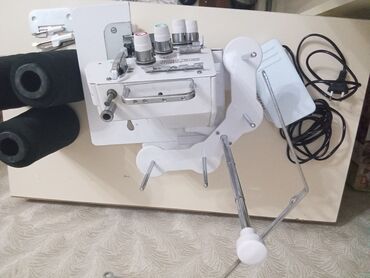 Tikiş maşınları: Tikiş maşını Yeni,Overlok, 4 saplı, Ünvandan götürmə — 2