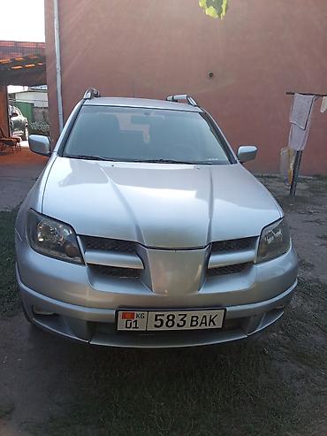 audi с 4: Mitsubishi Outlander: 2003 г., 2 л, Механика, Бензин, Кроссовер — 1