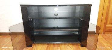 susə polka: Tumba Tv stendi - Rəng: qara, parlaq ön panel - Material: MDF — 2