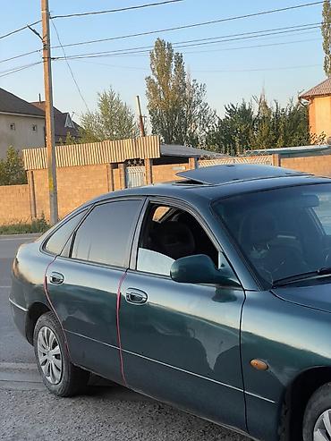 боз белер: Mazda 626: 1999 г., Кол менен иштөөчү, Седан — 1
