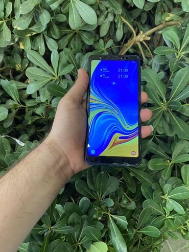 чехол samsung i9100: Samsung Galaxy A7 2018, 64 ГБ, цвет - Синий, Сенсорный, Отпечаток пальца, Беспроводная зарядка