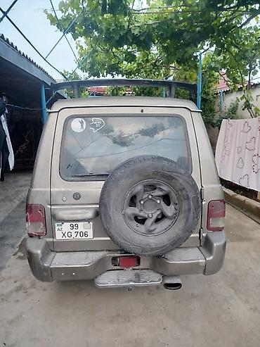 Digər avtomobillər: Off-road tipli 7 yerlik SUV - Kuzov: 5 qapılı, tavan relsləri və yan — 6