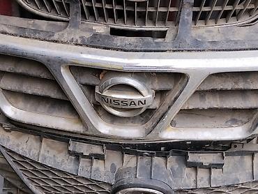Решетка радиатора Nissan с фирменной эмблемой. - Оригинальный дизайн at lalafo.kg Решетка радиатора Nissan с фирменной эмблемой. - Оригинальный дизайн