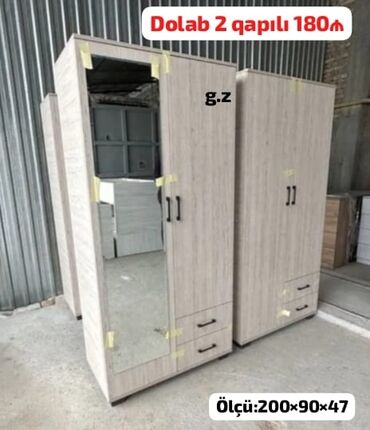 Komodlar: * *Dolab 2 qapılı 180Azn* *İstehsal Rusiya Laminat 18/lik