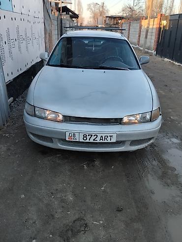 mazda 2000: Mazda Cronos: 1993 г., 1.8 л, Механика, Бензин, Хэтчбэк — 9