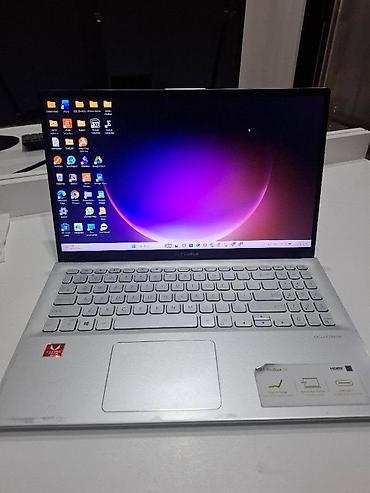 ASUS: 5 ildi istifadə edirəm. Yaxşı vəziyyətdədir, yüngül cızıqları var — 1