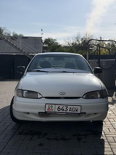 shevrolet lacetti: Sedan компакт-класса, 4 двери, белый цвет. Киргизские номера (KG) — 10