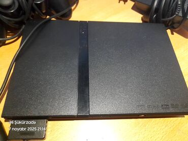 PS2 & PS1 (Sony PlayStation 2 & 1): İdelal vəziyyətdə plastation 2 slim+1konsol+1 adopdor+6 oyun -da lalafo.az — 15 PS2 & PS1 (Sony PlayStation 2 & 1): İdelal vəziyyətdə plastation 2 slim+1konsol+1 adopdor+6 oyun — 15