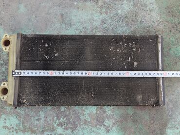 Радиаторы: Радиатор печки MAN L2000 - 8.150 / 8.163. Оригинал б/у, из Германии — 9