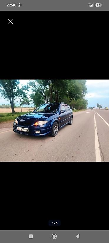 щуп демио: Mazda Familia: 2002 г., Хэтчбэк — 3
